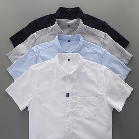 Camisas masculinas de manga curta nas cores branca, azul-clara, cinza e azul-marinho