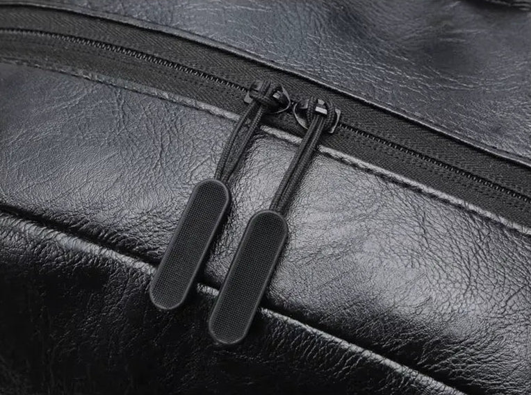 close up no fechamento em zíper resistente da mochila executiva valenteo savile